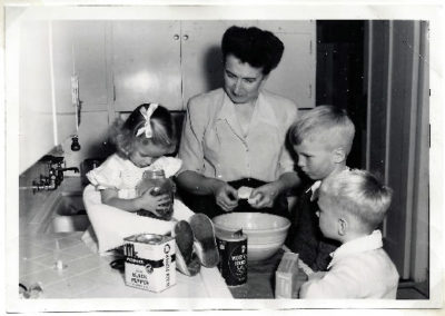 FCW cooking in her kitchen w-grandkids